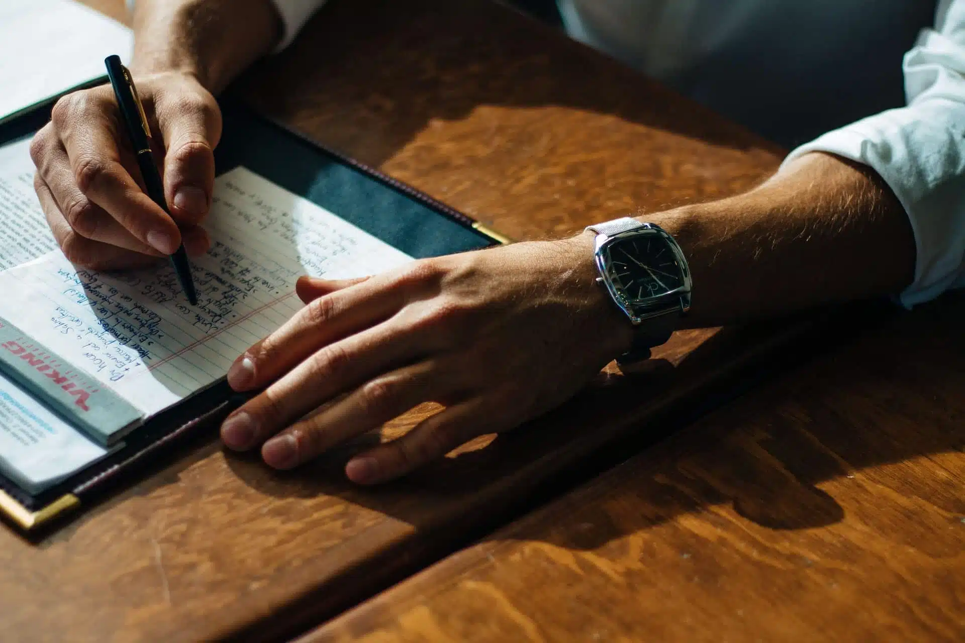 Man at desk writing