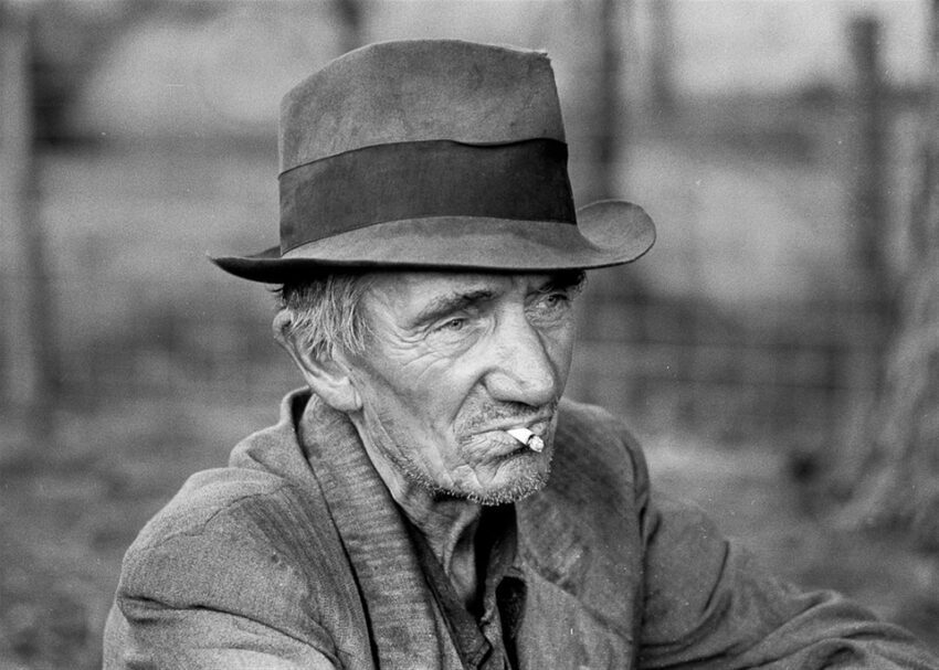 old man smoking a cigarette